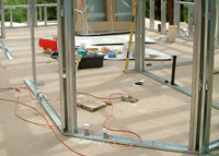 Wall studs for a steel framed house